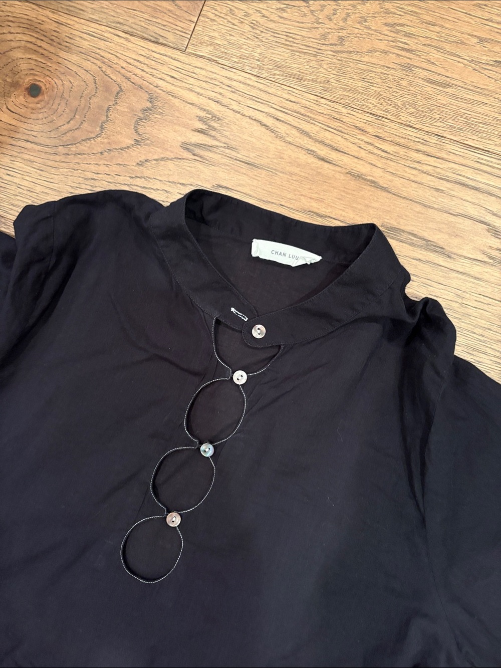 Chan Luu Black Peplum Long Sleeve Top with Ring Detail - Picture 2 of 3